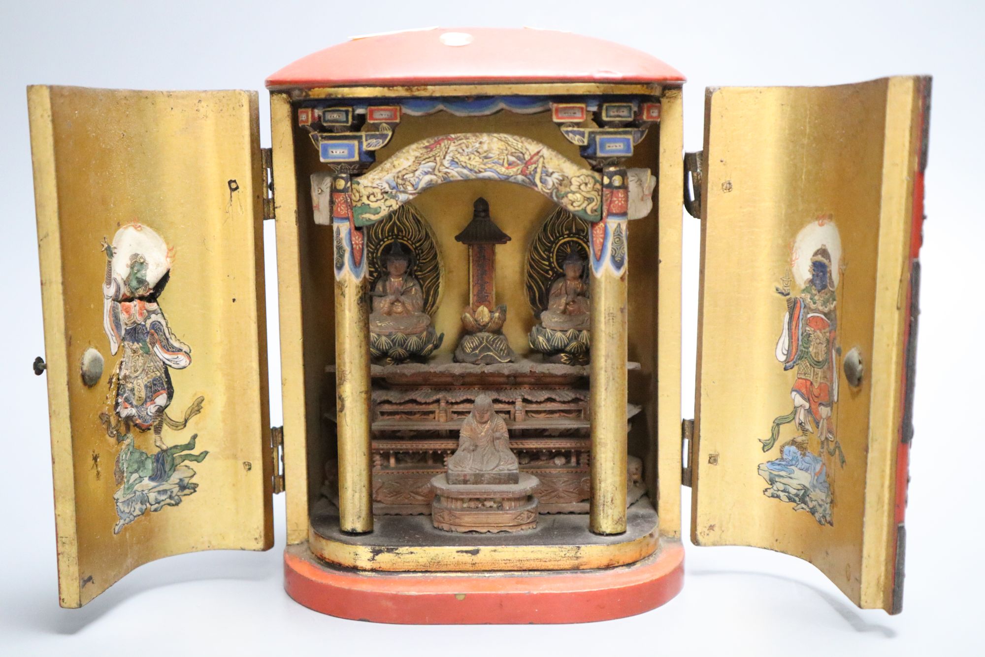 Three Japanese lacquer portable shrines (zushi), 19th century, tallest 15cm